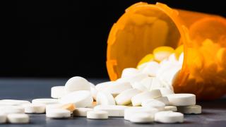 Drug Distributors Reach $300M Opioid Settlement